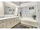 Elegant bathroom with soaking tub and vanity with double sinks at 8089 Lynch Ln, Indianapolis, IN 46250