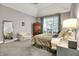 Bright bedroom featuring a large window and warm, neutral tones at 8089 Lynch Ln, Indianapolis, IN 46250