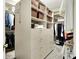 Walk-in closet with custom shelving and clothing racks at 8089 Lynch Ln, Indianapolis, IN 46250