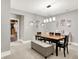 Basement dining area includes gray accent wall decor and neutral color scheme at 8089 Lynch Ln, Indianapolis, IN 46250