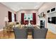 Well-appointed living room with hardwood floors, fireplace, built-ins and comfortable furniture at 8089 Lynch Ln, Indianapolis, IN 46250