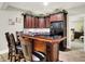 This home has a finished basement that includes a wet bar with beautiful dark cabinetry at 8089 Lynch Ln, Indianapolis, IN 46250