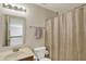 The bathroom has a shower and toilet at 8116 Barksdale Way, Indianapolis, IN 46216