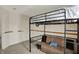 Charming loft bedroom featuring cozy seating, string lights, and a calming atmosphere at 8116 Barksdale Way, Indianapolis, IN 46216