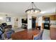 Open-concept living space with kitchen, dining area, and comfortable seating at 8116 Barksdale Way, Indianapolis, IN 46216