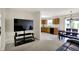 Open-concept living area seamlessly connects to the kitchen and dining space, perfect for modern living at 8116 Barksdale Way, Indianapolis, IN 46216