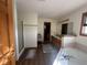 Bright bathroom featuring a soaking tub, walk-in shower, and wood-look floors at 82 Pin Oak Ct, Whiteland, IN 46184