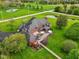 Lush backyard featuring an outdoor patio, mature trees and landscaping, creating a private oasis at 8362 N County Road 650 E, Brownsburg, IN 46112