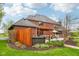 Well-maintained backyard featuring a patio with comfortable seating, a hot tub, and beautiful landscaping at 8362 N County Road 650 E, Brownsburg, IN 46112