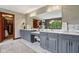 Modern bathroom features a double vanity, makeup counter and large mirror at 8362 N County Road 650 E, Brownsburg, IN 46112