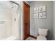 Bathroom features a tiled shower with glass doors and a modern toilet at 8362 N County Road 650 E, Brownsburg, IN 46112