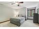 Serene bedroom featuring soft carpet, ceiling fan, and neutral paint for a calming atmosphere at 8362 N County Road 650 E, Brownsburg, IN 46112