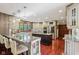 Well-lit kitchen featuring granite countertops, stainless steel appliances, and a kitchen island at 8362 N County Road 650 E, Brownsburg, IN 46112