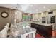 Bright, renovated kitchen with stainless steel appliances, and a large kitchen island at 8362 N County Road 650 E, Brownsburg, IN 46112