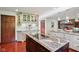 Spacious kitchen with large island, granite countertops, and open design great for entertaining at 8362 N County Road 650 E, Brownsburg, IN 46112