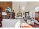 Comfortable living room showcasing a brick fireplace and large windows that fill the space with light at 8362 N County Road 650 E, Brownsburg, IN 46112