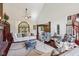 Airy living room with hardwood floors, large windows, and comfortable seating with a neutral color palette at 8362 N County Road 650 E, Brownsburg, IN 46112