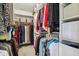 Spacious walk-in closet with ample storage including shelves and hanging racks for organized living at 8362 N County Road 650 E, Brownsburg, IN 46112