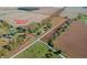 Sprawling property featuring mature trees and a mix of grassy and cultivated land at 9056 E 650 N, Wilkinson, IN 46186