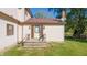 Back exterior view of a home featuring a small porch and traditional siding at 9056 E 650 N, Wilkinson, IN 46186