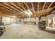 Large unfinished basement with workbench and plenty of room for activities at 9056 E 650 N, Wilkinson, IN 46186