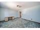 Bedroom features light blue walls with worn, patterned carpet and a wood trim at 9056 E 650 N, Wilkinson, IN 46186