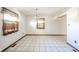Bright dining room with traditional chandelier fixture and a sunny window at 9056 E 650 N, Wilkinson, IN 46186