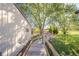 A wooden walkway leads to an outbuilding on the property at 9056 E 650 N, Wilkinson, IN 46186