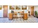 Bright kitchen features a breakfast bar with seating, complemented by decorative wall art and modern fixtures at 9056 E 650 N, Wilkinson, IN 46186