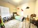 Charming bedroom with dinosaur wall decorations and a comfortable single bed at 914 Baden Manor Dr, Indianapolis, IN 46217