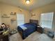 Cozy bedroom featuring a comfortable bed, bright natural light, and a neutral color scheme at 914 Baden Manor Dr, Indianapolis, IN 46217