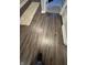 Hallway features dark wood flooring that leads to other rooms of the home at 914 Baden Manor Dr, Indianapolis, IN 46217