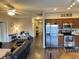 Open-concept layout seamlessly connects the living room with the kitchen, creating a spacious and inviting atmosphere at 914 Baden Manor Dr, Indianapolis, IN 46217