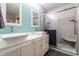 Bathroom features a modern double sink vanity and glass-enclosed shower at 9531 Charter Dr, Indianapolis, IN 46250