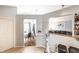 The open concept shows a dining area and living room with lots of natural light at 9531 Charter Dr, Indianapolis, IN 46250