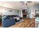 Inviting living room with comfortable seating, a brick fireplace, and stylish decor at 9531 Charter Dr, Indianapolis, IN 46250