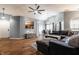 Open-concept living area with hardwood flooring, plenty of natural light, and access to the kitchen at 9531 Charter Dr, Indianapolis, IN 46250
