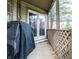 Covered patio includes a grill and string lights for a cozy space to enjoy the outdoors at 9531 Charter Dr, Indianapolis, IN 46250