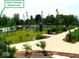 Grand Junction's playground, featuring a variety of modern play structures and lush landscaping at 00 Oak Rd, Westfield, IN 46074