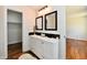 Bright bathroom featuring a double vanity, sleek black accents, and stylish fixtures at 1018 N 18Th St, Elwood, IN 46036
