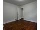This bedroom features hardwood floors and neutral paint at 1032 Groff Ave, Indianapolis, IN 46222
