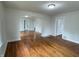 Spacious living room featuring hardwood floors and an open floor plan at 1032 Groff Ave, Indianapolis, IN 46222