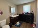 Functional bathroom with a sleek vanity, mirror, toilet, and clean, modern design at 1117 Hendricks Ave, Shelbyville, IN 46176