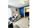 Bright bedroom featuring modern gray paint, fun wall decor, and stylish gray rug at 1117 Hendricks Ave, Shelbyville, IN 46176