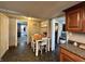 View of a dining area featuring wood table and white chairs at 1117 Hendricks Ave, Shelbyville, IN 46176