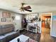 Inviting living room with a view of the kitchen, and modern decorative touches at 1117 Hendricks Ave, Shelbyville, IN 46176