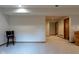 Spacious basement with neutral carpet, recessed lights, and doorways leading to other rooms at 11203 Westminster Way, Carmel, IN 46033