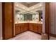 Bright bathroom featuring dual vanities, recessed lighting, and ample storage at 11203 Westminster Way, Carmel, IN 46033