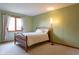 Bright bedroom with carpeted floors, a window, and a bed at 11203 Westminster Way, Carmel, IN 46033