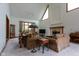 Spacious living room with lots of natural light, vaulted ceilings and cozy fireplace at 11203 Westminster Way, Carmel, IN 46033